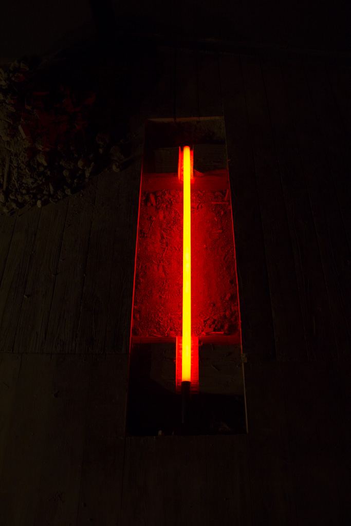 Archaeology — close-up of neon tube in wall recess