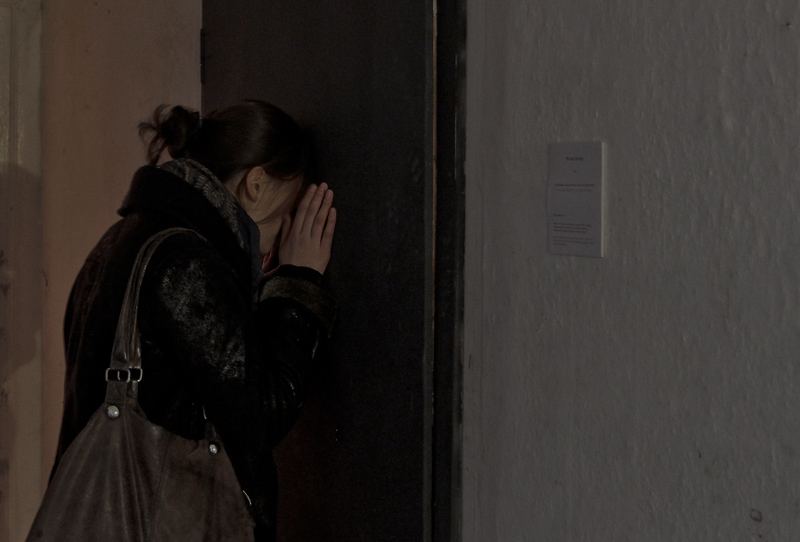 Lustmord — viewer looking through peep-hole