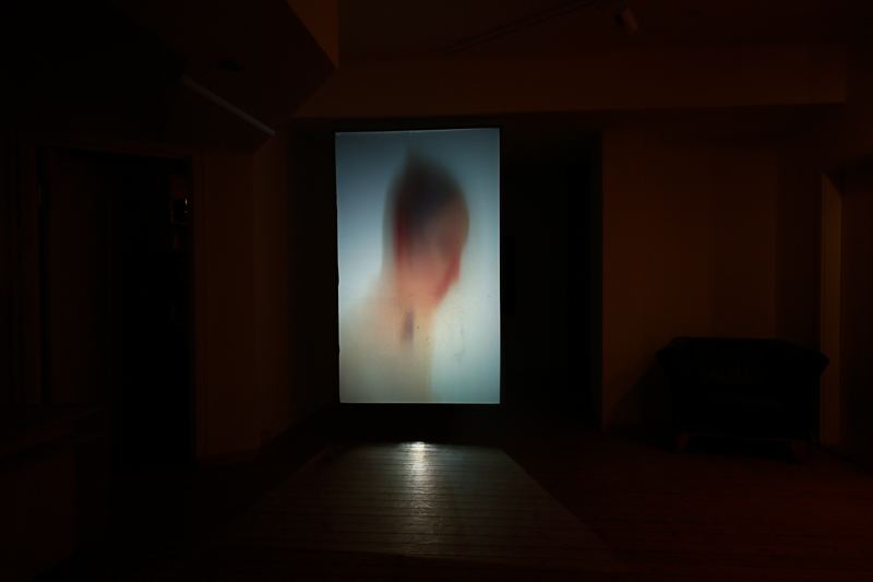 Shedding — projection in empty room
